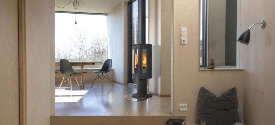 F 373 peis mellom stue, gang og kjøkken. Foto